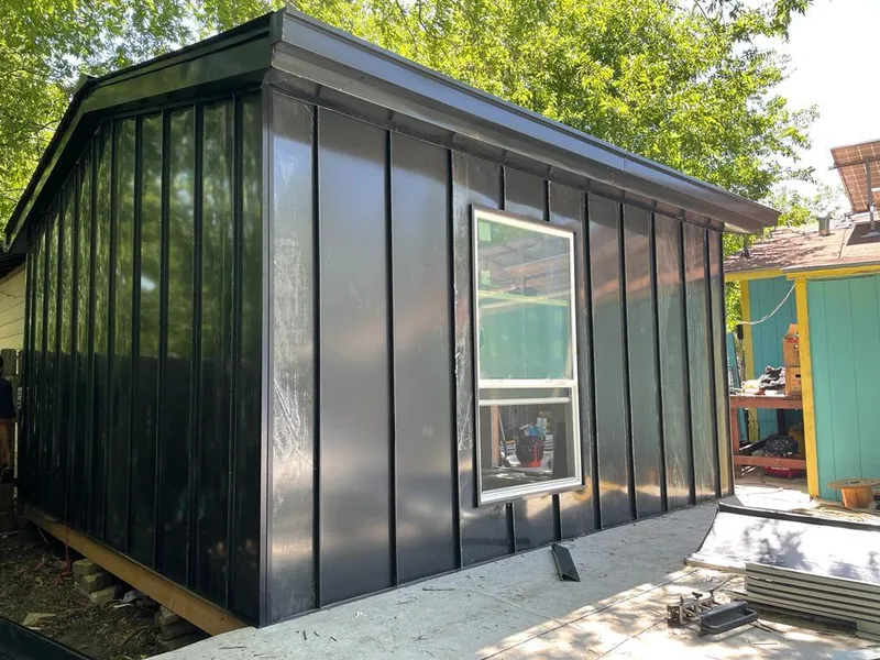 Black standing seam metal wall panels for Metal Roof Installation in Columbiana