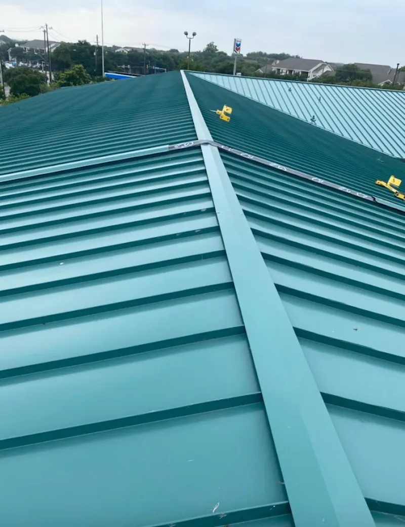 Green commercial metal roof ridge and valley for Metal Roof Repair in Columbiana